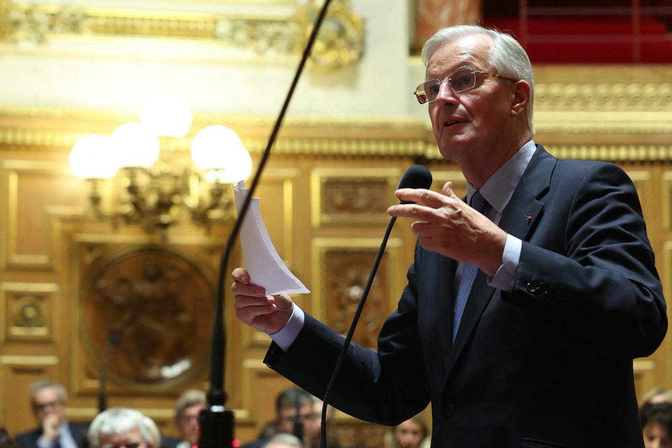 Le Premier ministre Michel Barnier lors de son discours au Sénat le 2 octobre 2024. ©THOMAS SAMSON/AFP